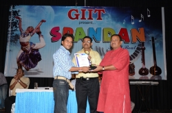 1st Topper in (BscIT-6) Award to Sanjeev Kumar by Mr. Dineshanand Goswami with Mr. Om Prakash, Director GIIT